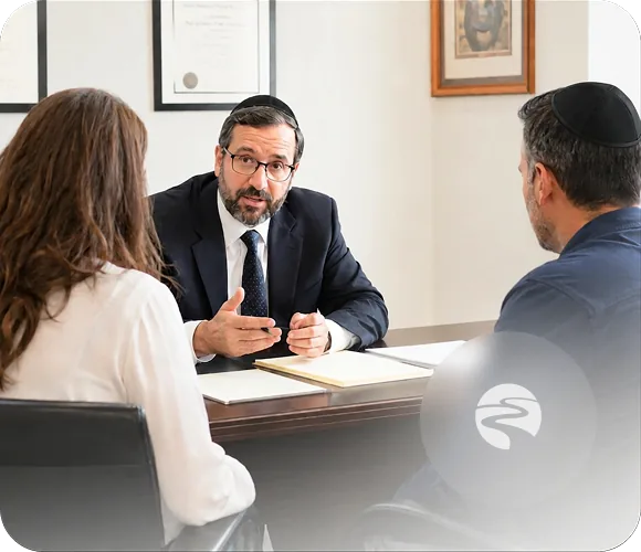 A mediator in conversation with a couple
