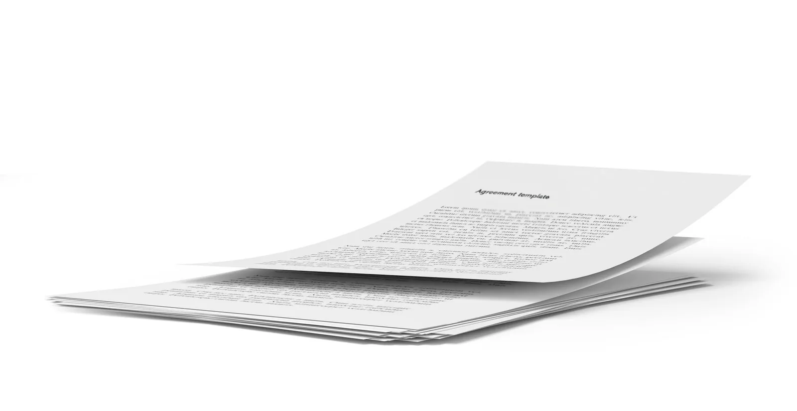 A stack of mediation agreement templates fanned across a desk